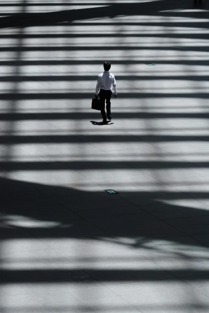 Service based business owner walks up stairs